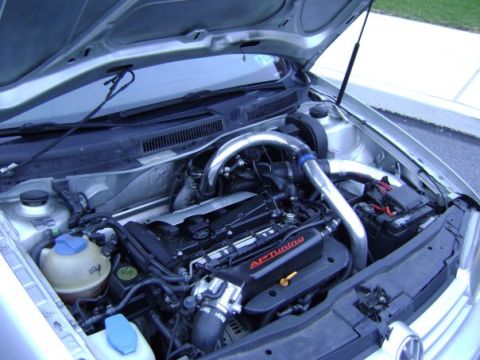 1993 Ford Probe - Aftermarket turbo piping and engine cover visible in the engine bay.