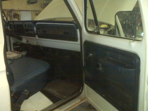 1973 Ford F-100 - Interior view of a 1973 Ford F-100, highlighting the dashboard and driver's side door panel.