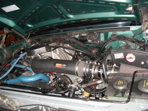 1990 Ford Bronco - Engine bay with aftermarket K&N air intake and supercharger visible.