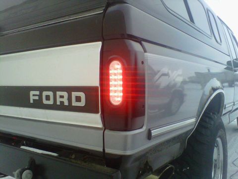 1994 Ford F-150 - Rear view of a 1994 Ford F-150 pickup truck, showing the taillight and 'FORD' lettering.