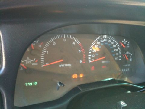 1966 Ford Bronco - The dashboard gauges show an odometer reading of 77910.