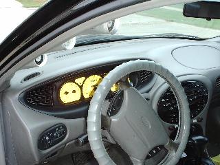 1997 Ford Taurus - Dashboard view of a 1997 Ford Taurus, showing the instrument cluster and steering wheel.