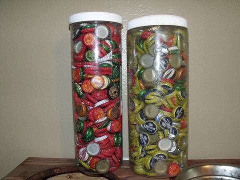 1992 Jeep Cherokee - Collection of beer bottle caps stored in two clear plastic jars.