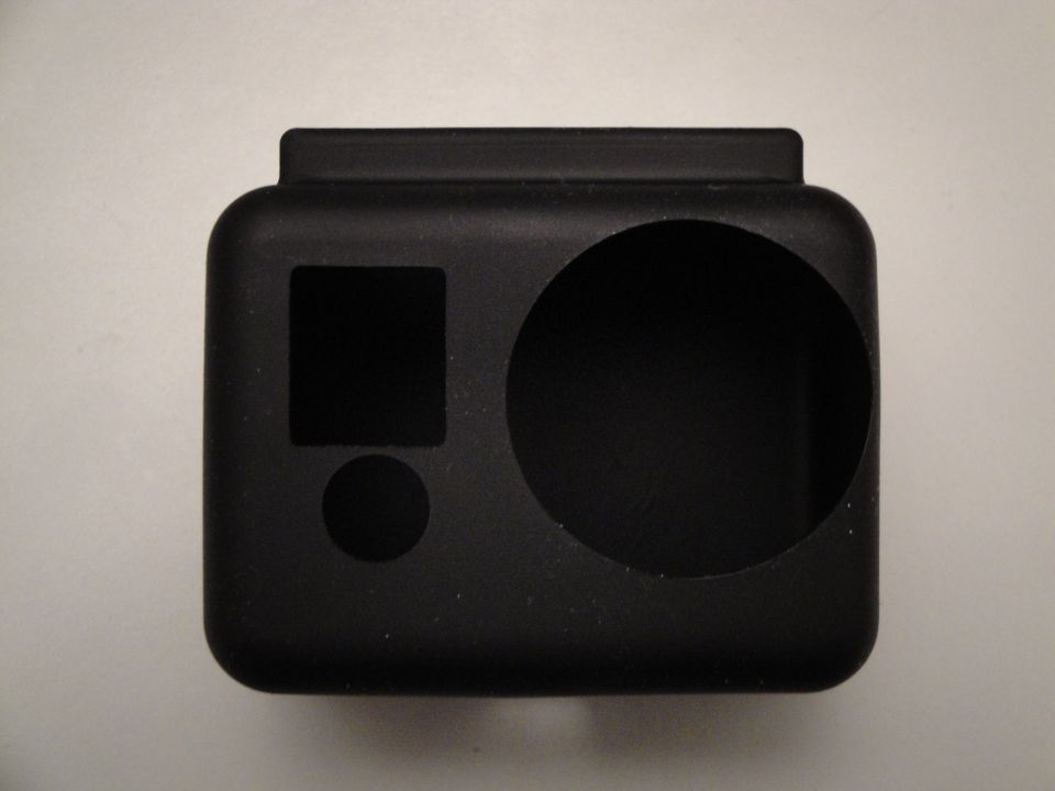 Black protective case for a camera, showing cutouts for lens and buttons