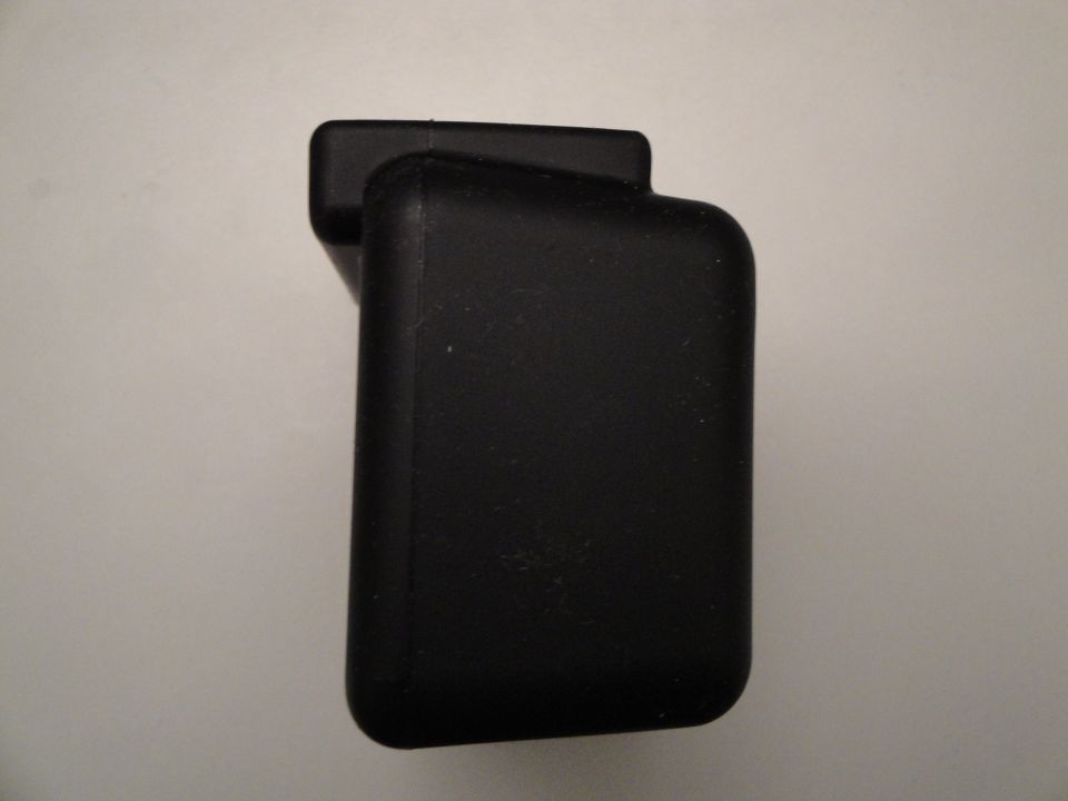Black camera housing with a rectangular protrusion