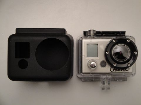 1993 Ford Taurus - A GoPro camera, identified by the 'HERO' logo, is shown next to its black protective case.