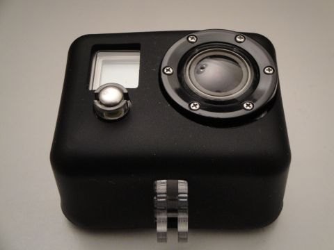 1993 Ford Taurus - A black action camera is mounted in a clear protective housing.