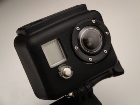 1993 Ford Taurus - Close-up view of a black action camera, showing its lens and a small display screen.