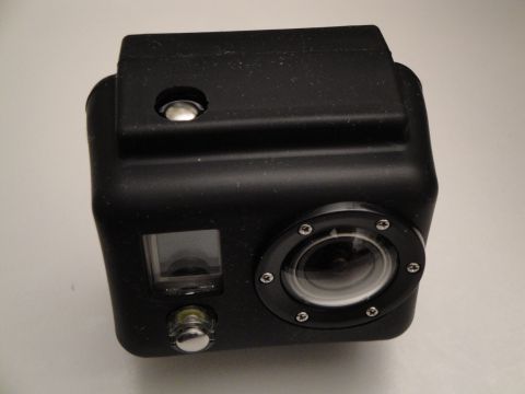 1993 Ford Taurus - A close-up view of a black action camera, showing its lens and display screen.
