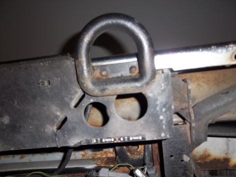 1995 Ford Bronco - Close-up of a tow hook mount, a Supermotors.net watermark.