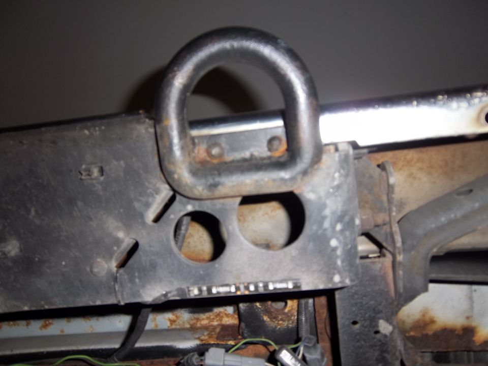 Tow hook mount with visible Supermotors.net logo