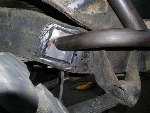 1979 Ford Bronco - Close-up of a custom welded reinforcement plate on a vehicle's frame, with a Supermotors.net watermark visible.