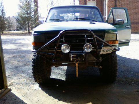 1996 Ford Bronco - This 1996 Ford Bronco is equipped with a custom brush guard and off-road tires.