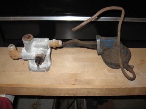 1963 Ford Galaxie - This is a vintage fuel pump and filter assembly, likely for an older vehicle.