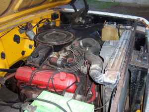 1971 International School Bus - Close-up view of the engine compartment, showing the V8 engine and associated components.