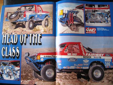 1986 Ford Bronco - This off-road race truck is featured in a magazine article about racing.