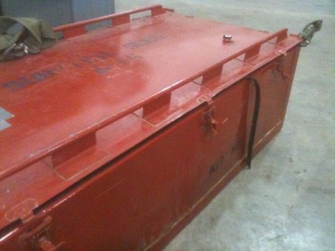 1986 Chevrolet Blazer - A red metal storage container with visible latches and handles is shown in this image.