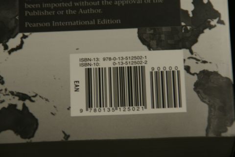 1993 Ford Taurus - The image shows the back cover of a book, a barcode and ISBN information.
