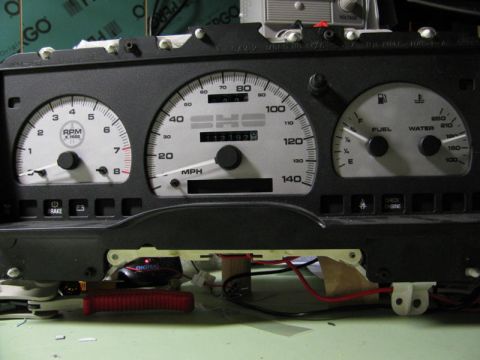 1994 Ford Taurus - A close-up view of a car's instrument cluster, displaying various gauges and an odometer reading of 112,192.