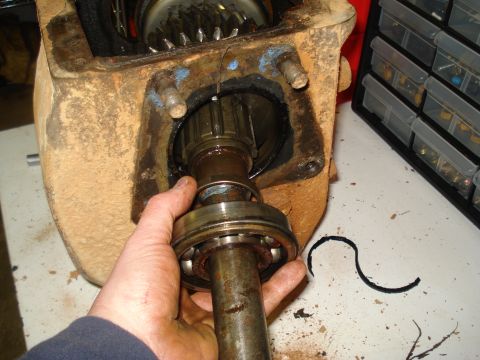 1991 Ford Bronco - Removing a bearing from a vehicle's drivetrain component.