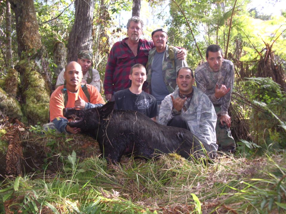 Big Island hunting with Rooster at bottom right with Gabby Gonsalves and Vance at far right and their friends.