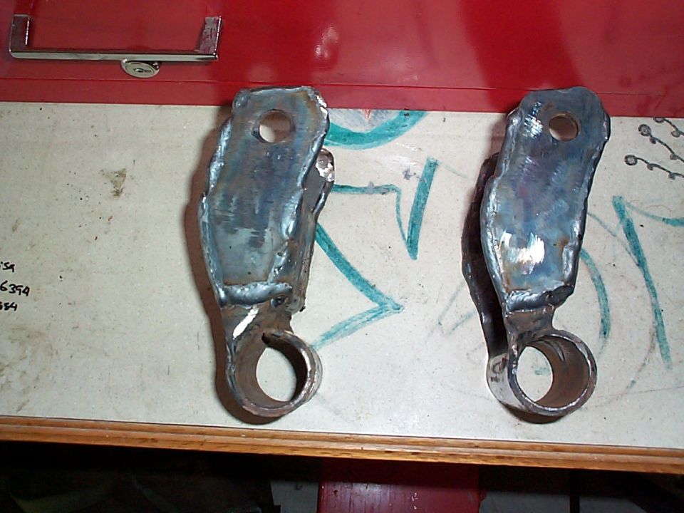 The legs are plated with 1/8" and the cross section is plated with 3/16" lowered to reduce the lever arm of the legs.  The spring eye still fits with no
interference.