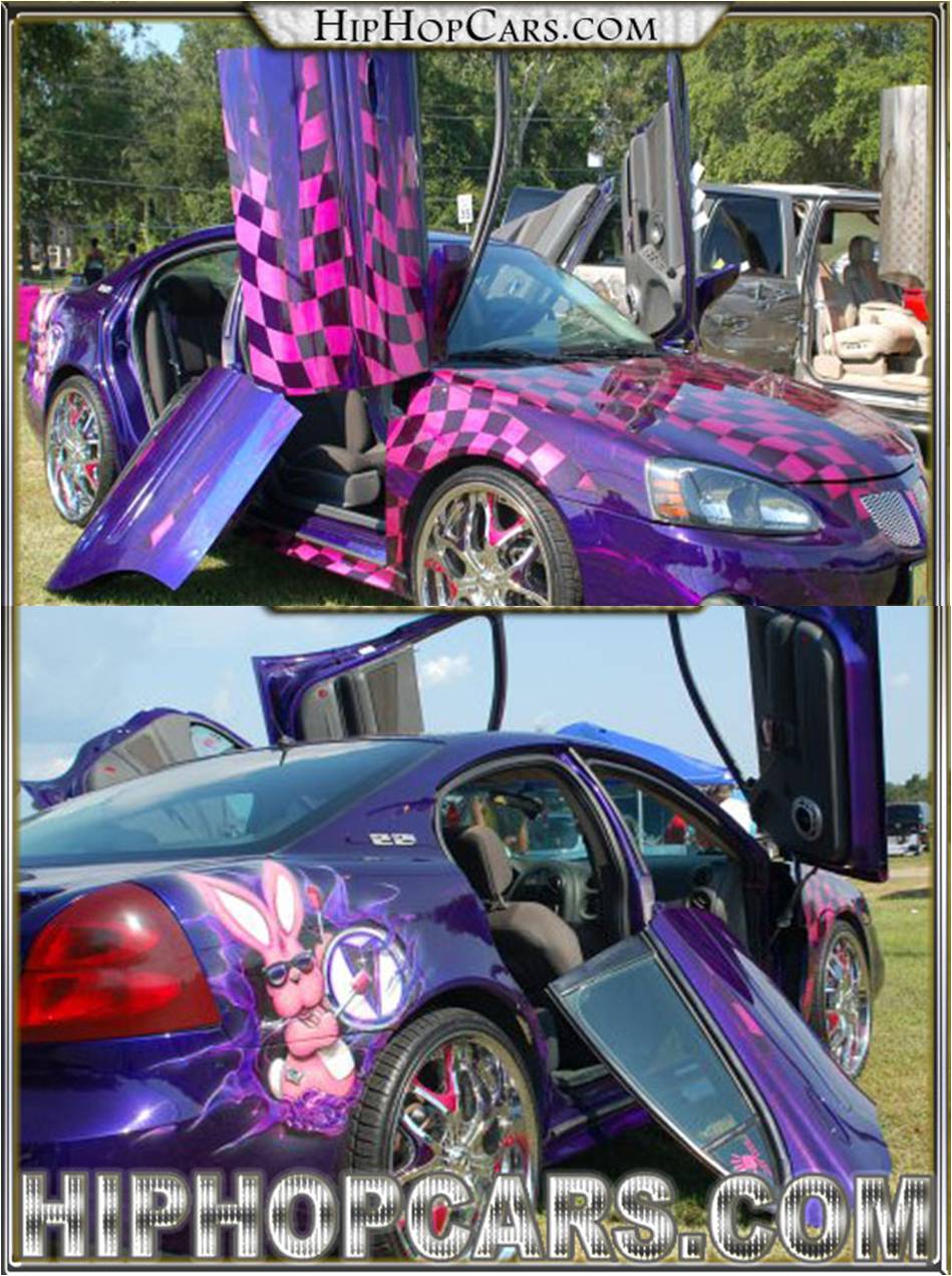 Purple Pontiac show car with lambo doors, checkerboard paint and airbrushed bunny mural