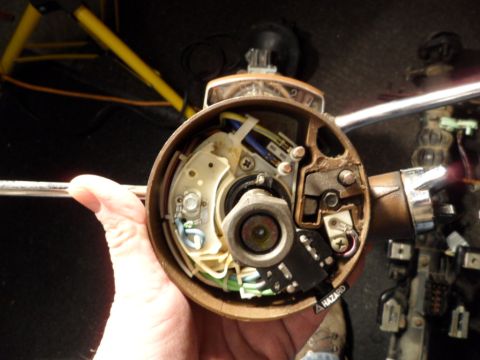 1973 Ford Ranchero - Steering column ignition switch assembly with visible wiring and hazard light switch.