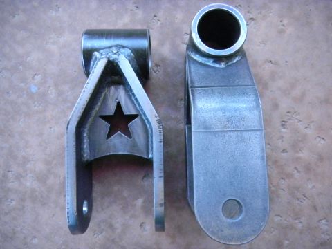 1997 Ford Ranger - Custom fabricated suspension parts shown side-by-side.