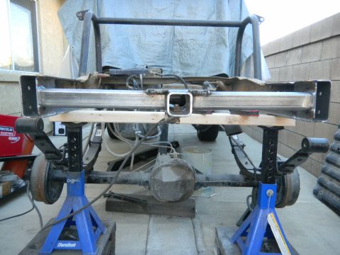 1997 Ford Ranger - Custom rear bumper and axle assembly being worked on, supported by jack stands.