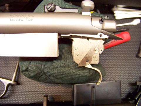 1995 Mercury Grand Marquis - The internal mechanism of a Remington Model 700 rifle is shown, including the trigger and magazine well.
