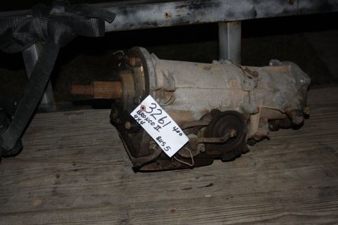 1984 Ford Bronco II - A used transfer case is shown, with a tag indicating it is for a Bronco II 4x4.