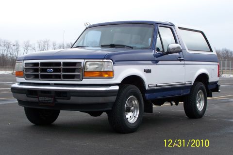 1996 Ford Bronco - This 1996 Ford Bronco features a two-tone blue and white paint scheme with chrome accents.