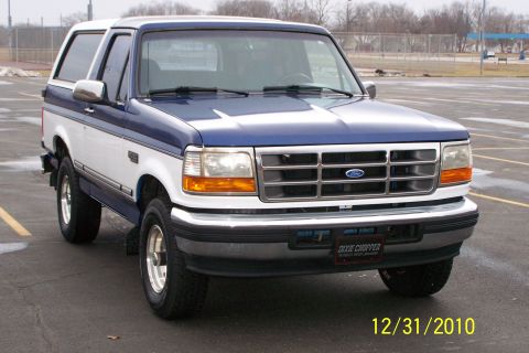 1996 Ford Bronco - This 1996 Ford Bronco is a two-tone blue and white SUV with a removable hardtop.