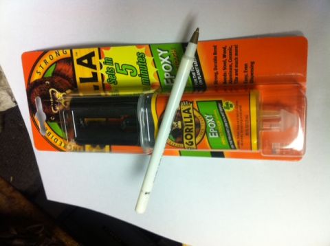 1979 Chevrolet C/K Pickup - Packaging for Gorilla Epoxy, which sets in 5 minutes, is shown with a pen resting on it.