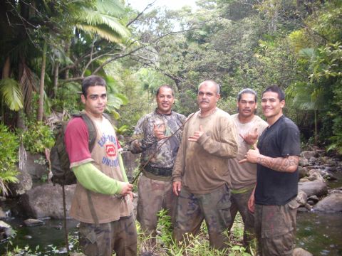 1991 Ford Bronco - Group of men posing for a photo in a lush, tropical jungle environment.