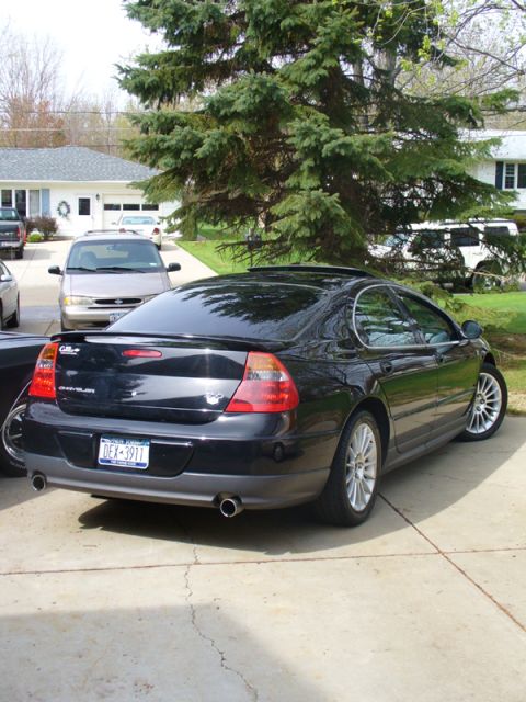 2002 Chrysler 300M - Rear view of a black Chrysler 300M sedan with a license plate that reads DEX-3911.
