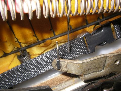 1990 Ford Bronco - Close-up view of car seat interior components, including springs and webbing.