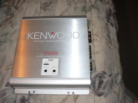 1978 Ford Bronco - This Kenwood PS150 amplifier is displayed on a patterned surface, showing its model number and brand name prominently.