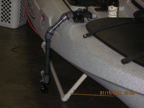1953 Ford Mainline - A kayak is shown with a custom PVC pipe mount and a bottle of Shiner beer on the seat.