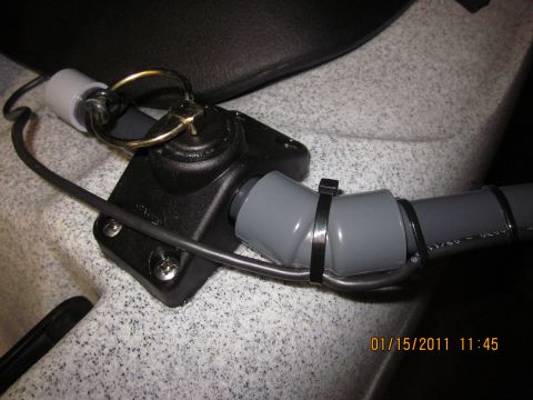 1953 Ford Mainline - Close-up of kayak rigging components, including a black mount and gray tubing, with a timestamp in the corner.