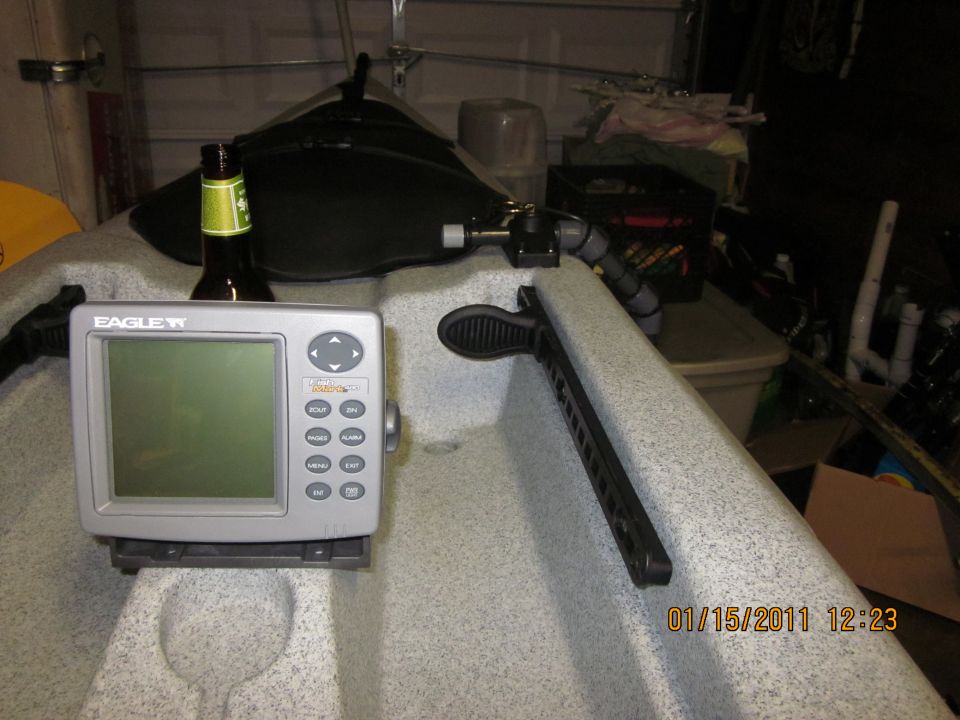 Kayak interior with Eagle fish finder, bottle, and paddle mount