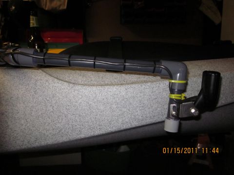 1953 Ford Mainline - A close-up view of a custom kayak accessory mount, showing its construction and attachment.