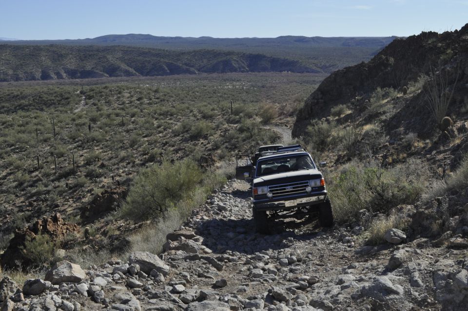 1991 Ford Bronco on rocky desert trail