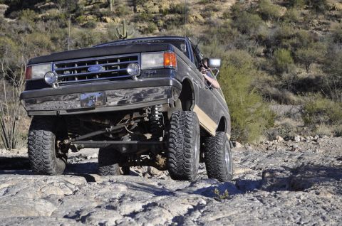 1991 Ford Bronco - This 1991 Ford Bronco is navigating a rocky off-road path.