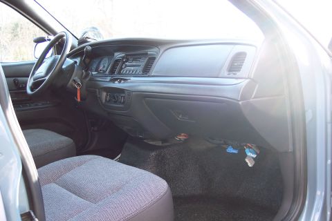 2001 Ford Crown Victoria - The interior of a 2001 Ford Crown Victoria is visible from the passenger side.