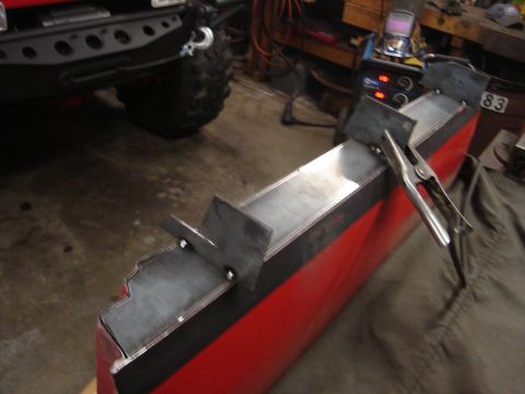 1989 Ford Bronco - Metal fabrication project in progress with welding equipment visible in the background.
