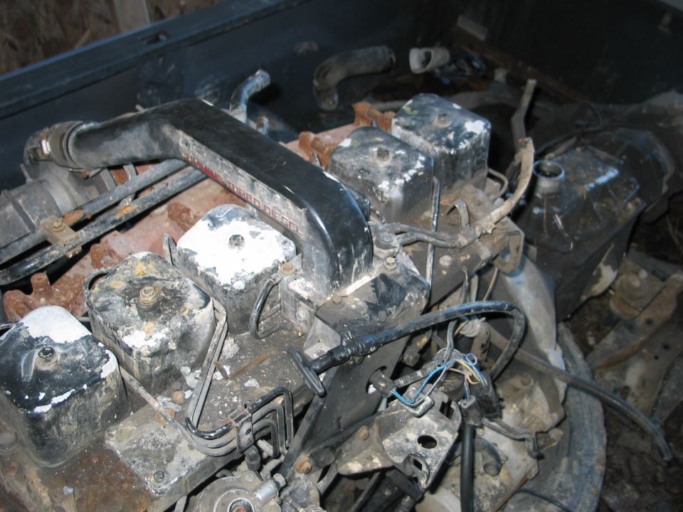 diesel engine with black intake manifold and red lettering