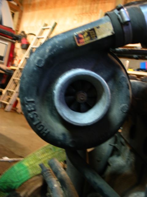 1984 Ford Bronco - Close-up of a HOLSET turbocharger, likely part of an engine modification.