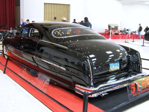 2000 Mercury Grand Marquis - Customized 1950s Mercury sedan on display at a car show.